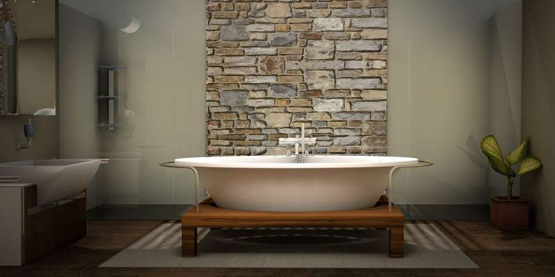 Bild: Natürliche Schönheit - Die Verwendung von Naturstein und Holzelementen verleiht diesem Badezimmer einen rustikalen Charme und schafft eine harmonische Verbindung zur Natur
